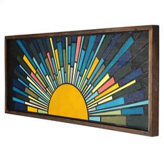 a painting on the wall that looks like it is made out of stained glass and wood