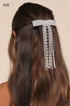 We can't imagine a more perfect finish to your look than the Lulus Sparkling Sophisticate Silver Rhinestone Bow-Shaped Barrette! This completely iconic hair barrette boasts a bow-shaped design, encrusted with cubic zirconia rhinestones in baguette and round cuts. The tails of the bow form two adorable sections of fringed rhinestone trim, for a look that was meant to shine under the spotlight! Barrette closure. Measures 4" Wide And 6. 5" Long. 60% Metal, 40% Cubic Zirconia. Imported. Lulus | Spar Iconic Hair, Silver Hair Accessories, Diamond Hair, Rhinestone Hair Comb, Diamond Bows, Bow Hair Accessories, Rhinestone Bow, Rhinestone Trim, Silver Rhinestone