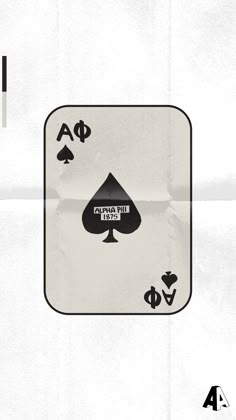 the back side of a playing card with four spades on it, and three other symbols