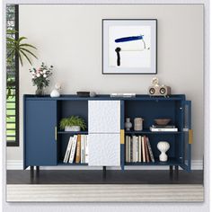 a blue bookcase with books on it in a living room