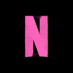 the letter n is made up of triangular shapes and pink paper on a black background