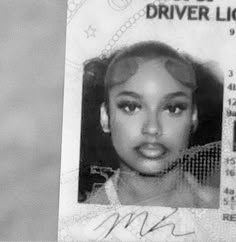 the driver's id card shows an image of a woman with her hair pulled back