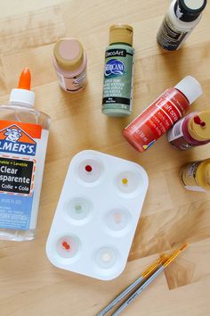 the supplies needed to make this craft include paint, acrylic and watercolors