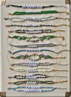 an assortment of beaded bracelets on display