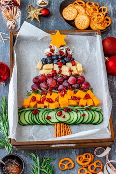 a christmas tree made out of fruits and vegetables