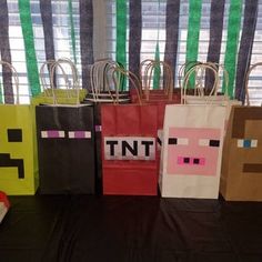 some paper bags that are sitting on a table