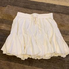 Cream White Mini Skirt Drawstring, Runs Like 6-8 Day Out Skirt With Drawstring, Drawstring Skirt For Day Out, Flowy Drawstring Skirt For Day Out, Spring Beach Skirt With Drawstring, Flowy Drawstring Skirt For Vacation, Vacation Skirt With Drawstring, Beach Cotton Skirt With Drawstring, Beach Skirt With Drawstring, Chic Spring Skirt With Drawstring