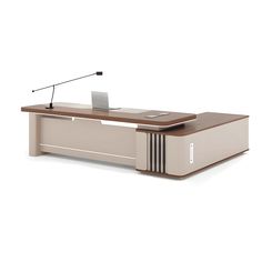 an office desk with a laptop on it