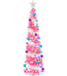 a pink christmas tree decorated with multi colored balls and stars on it's top