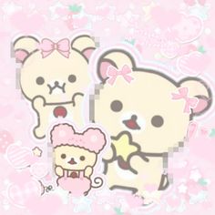 two cute little bears with bows on their heads and one is holding a teddy bear