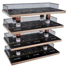 three tiered display case with liquor bottles