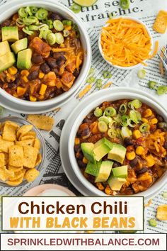 three bowls of chicken chili with black beans, cheese and avocado on the side