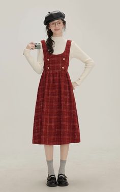 The sweetest little apple in town. This pinafore dress features a scoop neckline and thick shoulder straps for layering, heart buttons on the chest, cinched waist with a big bow behind, and a midi length skirt on a plaid tweed fabric. Opens easily with a concealed side zipper. S: 28" chest, 24.5" waist, 42.5" lengthM: 29.5" chest, 26" waist, 42.5" lengthL: 31" chest, 27.5" waist, 43" lengthXL: 32.5" chest, 29" waist, 43" length Pinafore Dress Outfit, Vintage Pinafore Dress, Vintage Pinafore, Fall Dress Outfit, Midi Length Skirts, Tweed Fabric, Big Bow, Pinafore Dress, Overall Dress