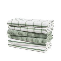 four towels stacked on top of each other in green and white checkerboard pattern