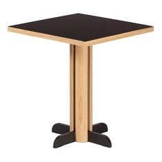 a square wooden table with black top and two pedestals on each side, viewed from the front