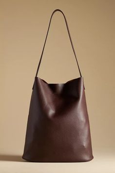 Tall Bucket Bag | Anthropologie Black Bucket Bag Outfit, Modern Tote-style Shopping Pouch, Modern Tote Pouch For Shopping, Rectangular Leather Pouch For Shopping, Modern Pouch Box Bag For Errands, Modern Rectangular Shopping Pouch, Classic Large Capacity Pouch Shoulder Bag, Large Capacity Tote Pouch For Shopping, Large Capacity Tote Shopping Pouch