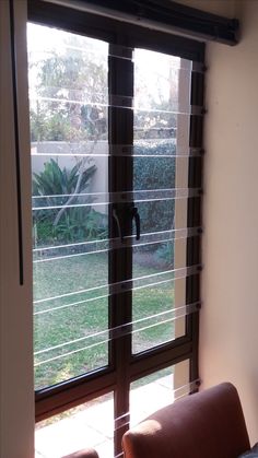 a living room with sliding glass doors leading outside