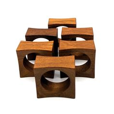 six pieces of wood sitting on top of each other