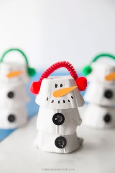 these snowmen are made out of toilet paper