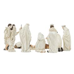 the figurines are all dressed up and ready to be put into the nativity