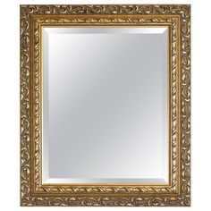 an ornate gold framed mirror on a white background