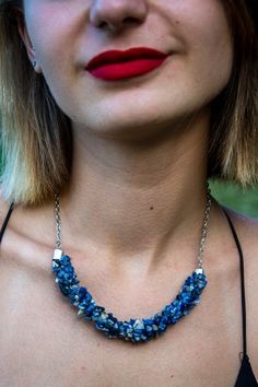 Embrace the enchanting allure of our Handmade Sodalite Stone Necklace, a true masterpiece crafted from broken gemstones that exude a sense of unique beauty and character. This bespoke necklace is thoughtfully designed to capture attention and complement your individual style with its captivating charm. The focal point of this exquisite necklace is the Sodalite gemstone, renowned for its deep, mesmerizing blue hues and natural patterns. Each Sodalite fragment is carefully selected and skillfully Handmade Blue Fusion Necklaces, Handmade Blue Fusion Necklace, Handmade Blue Fusion Style Necklace, Blue Handmade Fusion Style Necklace, Lapis Lazuli Gemstone Crystal Necklaces For Jewelry Making, Lapis Lazuli Gemstone Necklace For Jewelry Making, Kyanite Necklace With Natural Stones For Gifts, Bohemian Blue Necklace With Raw Stone, Blue Fusion Jewelry With Natural Stones