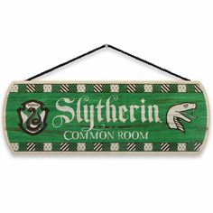 a wooden sign hanging from the side of a wall that says, southern common room