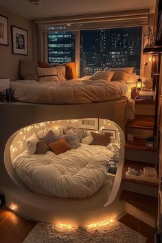 two beds in a room with lights on the bottom and top bunks above them