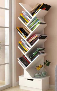 a white book shelf filled with lots of books