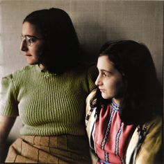 two women are sitting next to each other