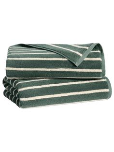 two towels folded on top of each other in green and white striped pattern with black trim