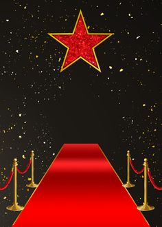 a red carpet with gold poles and a star on top