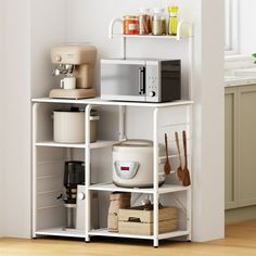 a kitchen shelf with various appliances and utensils