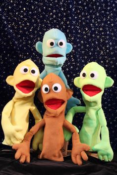 the sesame street characters are posed together for a group photo with stars in the background