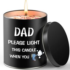 a candle that is inside of a black tin with the words dad please light this candle when you're gone