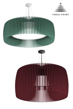 two circular lights hanging from the ceiling in different shades of green, red and white