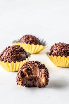 three chocolate truffles sitting on top of each other with the words nutella fudge above them