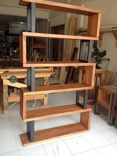 the shelves are made out of wood and metal