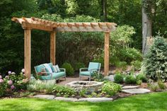 an outdoor seating area in the middle of a garden