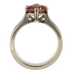 This stunning morganite engagement ring features a cushion cut stone in a pretty pink hue. Its genuine, Gibeon meteorite inlay is gently nestled in polished gold and features a unique Widmanstätten pattern. An alternative engagement ring like no other! RING LAYOUTRing Width: Reversed Tapered 4 mm to 2.5 mmRing Sleeve: 14k White GoldRing Profile: FlatRing Finish: Polished 0.75 mm 14k White Gold2.5 mm Gibeon Meteorite0.75 mm 14k White Gold Morganite (Qty: 1)Shape/Size: Cushion Cut, 6 mm Quality/Co Cushion Cut Morganite Engagement Ring, Pink Cushion Cut Morganite Jewelry, Meteorite Engagement Ring, Gibeon Meteorite, Pink Sapphire Ring Engagement, Meteorite Jewelry, Alternative Engagement Ring, Romantic Proposal, Meteorite Ring