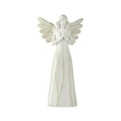 an angel figurine is shown on a white background