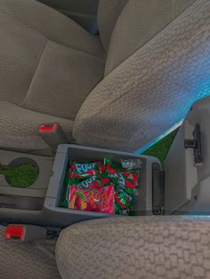 a car seat with some candy in it