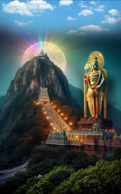 an image of a statue on top of a mountain with a rainbow in the sky