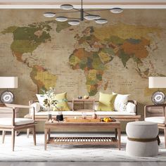 a living room filled with furniture and a large map on the wall