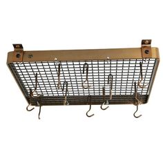 a metal basket with hooks hanging from it