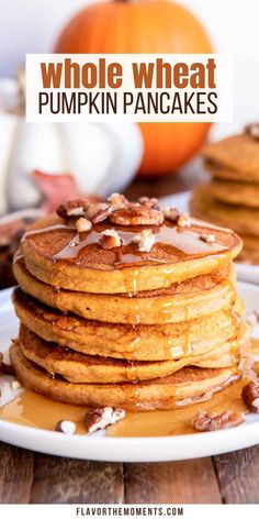 stack of whole wheat pumpkin pancakes with maple syrup drizzled on top and pecans in the background