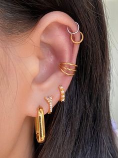 This basic three layer clicker hoop is the perfect piece for your piercing collection! Its not-so-basic design will make sure your piercing stands out, while its clicker/conch /nose ring/helix hoop fits any style. Get clicking! !!! (Hoop Nose Ring) Detail： -Material: gold/black plated with internal stainless steel or stainless steel -Internal diameter: 8mm/10mm -Gauge: 16g| 1.2mm -Single item -Clicker/conch /nose ring/helix hoop * Get inspired: 365 days ear piercings challenges-clicker here for more ear style. * Piercings are sold individually for layering purposes. Sold individually. Mix and match the pieces for a unique layered look. *For healed piercings* Kinds Of Roses, Piercing Collection, Hoop Nose Ring, Conch Hoop, Conch Jewelry, Whimsical Flowers, Helix Hoop, Ear Style, Daisy Studs