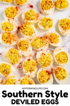 deviled eggs with sprinkles on them and the words southern style deviled eggs