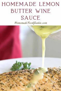 homemade lemon butter wine sauce being drizzled over chicken breast on a white plate