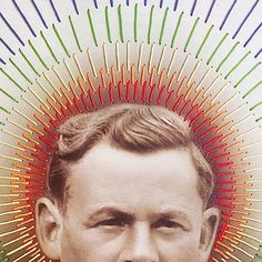 an old photo of a man in front of colored lines on the back of his head